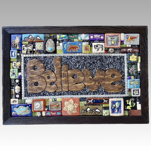 Clay mosaic artwork with "Believe" hand-sculpted from clay in the center, surrounded by natural stones and glass tiles. Oher tiles fill in the rest of the piece with wildlife, animals, bears, bison, birds, dragonflies, flowers, mountains, and other outdoorsy images. Unique gift idea for nature lover or outdoor enthusiast