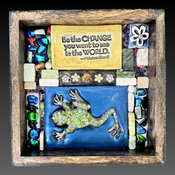 Clay mosaic artwork with sparkly tree frog and "be the change you want to see in the world" surrounded by dichroic glass and handmade tiles with flowers. Unique gift idea for nature, wildlife, or animal lover.