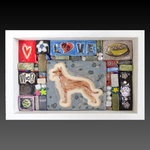 Clay mosaic artwork with Belgian malinois dog, food bowl, love, pawprint, woof, ball
